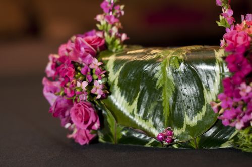 fushia flower purse with roses, kalanchoe, anemones and cyclamen, Portland Art M
