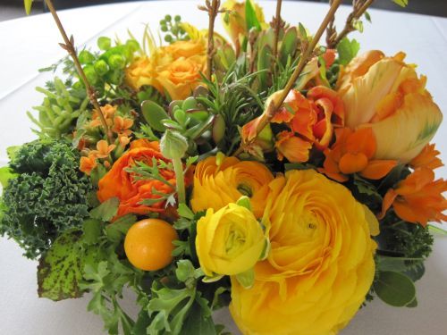 spring arrangement with ranunculus, tulips, roses and citrus, Françoise Weeks