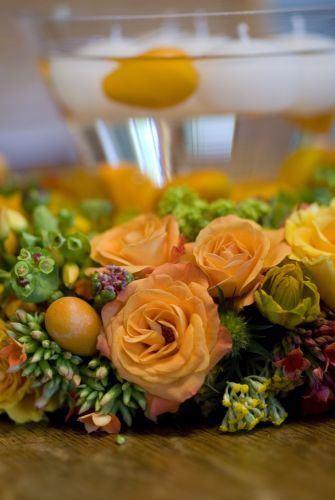 wreath of orange spring  flowers, kumquats and floating candles, Françoise Weeks