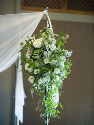 cascading arrangement of white and green flowers for chuppah, Françoise Weeks